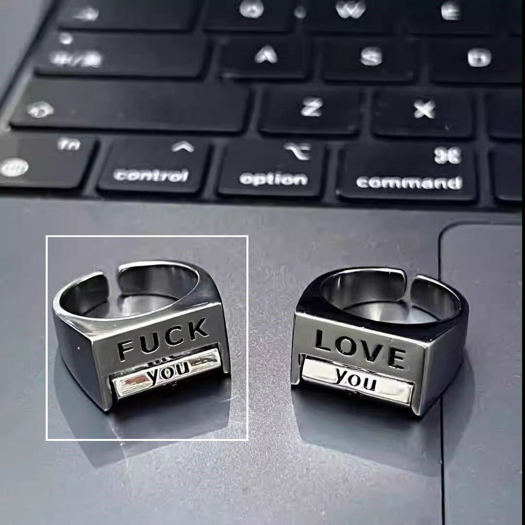1 つ買うと 1 つ無料 - 「FUCK」と「LOVE」のリングを回して楽しむ